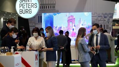 Visitors tour some of the exhibition stands at Arabian Travel Market. Pawan Singh / The National