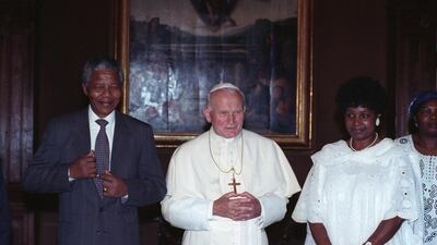 Pope John Paul meets with Nelson Mandela and his wife Winnie at the Vatican June 15, 1990. Mandela is mid-way through a tour aimed at persuading governments to maintain sanctions against South Africa until apartheid is abolished. Reuters