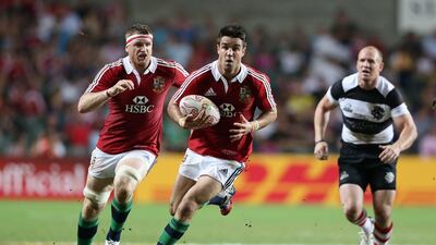 HONG KONG - JUNE 01: Conor Murray of the Lions charges upfield during the match between the British & Irish Lions and the Barbarians at Hong Kong Stadium on June 1, 2013, Hong Kong. (Photo by David Rogers/Getty Images) *** Local Caption *** 169759802.jpg
