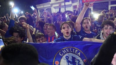 Chelsea supporters celebrate in streets surrounding their Stamford Bridge stadium in London their Champions League victory. AFP