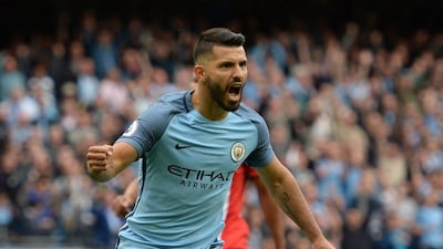 Manchester City striker Sergio Aguero celebrates scoring the opening goal from the penalty spot during the Premier League football match between Manchester City and Sunderland at the Etihad Stadium in Manchester, north west England, on August 13, 2016. Oli Scarff / AFP
