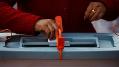 A woman casts her vote in Thimi. Navesh Chitrakar / Reuters