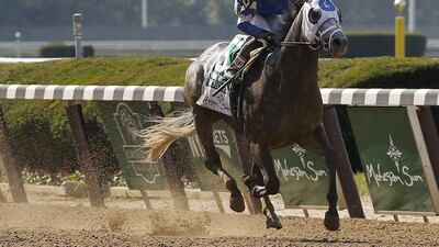 Frosted, with jockey Joel Rosario up, approaches the finish line to win the Metropolitan Mile at Belmont Park on Saturday. Kathy Willens / AP / June 11, 2016