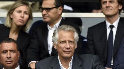 Alexandre Djouhri, left, seen with France's former prime minister Dominique de Villepin, centre. AFP/FRANCK FIFE