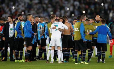 Real Madrid’s Cristiano Ronaldo and Marcelo celebrate winning the Fifa Club World Cup following a 1-0 win over Gremio at Zayed Sports City in Abu Dhabi. Matthew Childs / Reuters