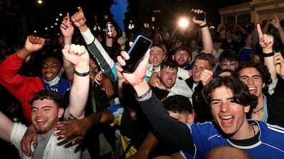Chelsea supporters celebrate in streets surrounding their Stamford Bridge stadium in London their Champions League victory. AFP