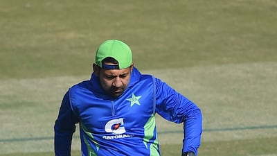 Pakistan's Sarfaraz Ahmed plays with ball during a training session in Karachi. AFP