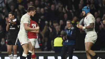 England’s Jack Nowell and Owen Farrell celebrate at the end of the match. Reuters / Toby Melville