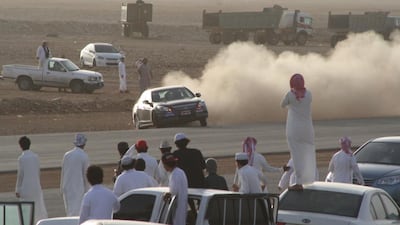 Young Saudis gather to watch joyriding, an illegal activity that Pascal Menoret says is a reaction to the restrictive social milieu. Courtesy The Best