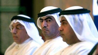 Huseyin Al Abdullah, chairman of Qatar Exchange, left, Hamad Al Shamsi, the deputy chairman of Abu Dhabi Securities Exchange, centre, and Abdullah Salem Al Turifi, chief executive of the Securities and Commodities Authority at the opening session of Arab Federation of Exchanges Annual Conference 2011 yesterday. Ravindranath K / The National