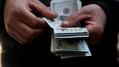 The US dollar fell by about 9 per cent against a basket of currencies last year, its worst performance since 2017. Reuters