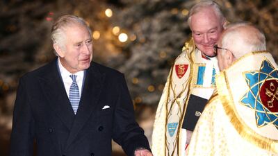 Britain's King Charles III talks with Dean Hoyle at the Together at Christmas carol service. Reuters
