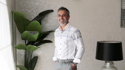 Dhiren Harchandani says he was a spender in his early 20s and turned a saver in his late 30s. His biggest financial inspiration is Warren Buffett. Photo: Pawan Singh / The National