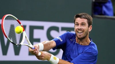 Cameron Norrie returns to Nikoloz Basilashvili. AP Photo