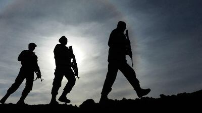 Afghanistan border police march during an exercise at a police academy outside Herat. Aref Karimi / AFP