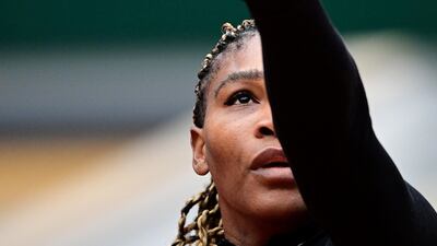 Serena Williams serves the ball to Kristie Ahn. AFP