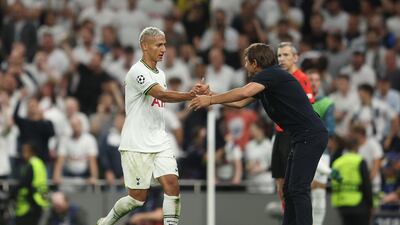 Richarlison celebrates with Antonio Conte after scoring the first goal. Getty