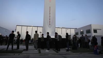 Attendees gather at an unveiling event for the Tesla Inc. Model Y crossover electric vehicle. Bloomberg