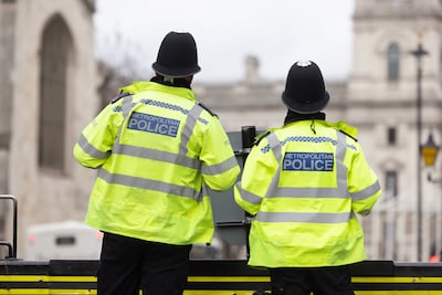 Metropolitan Police officers outside the Houses of Parliament in London. We should not kid ourselves that the real police are ultimately there to help ensure our safety, in whichever country we live. Getty Images