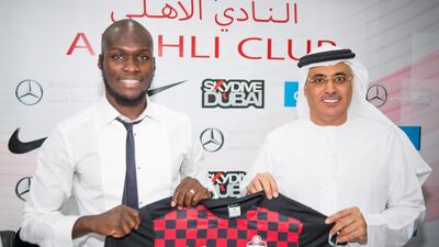 Al Ahli’s new signing Moussa Sow, left, was introduced by the club’s chief executive Ahmed Khalifa in Dubai on Wednesday. Alex Atack for The National