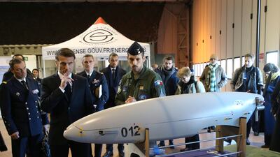 French President Emmanuel Macron inspects a military drone during a visit to Mont-de-Marsan air base, Nouvelle-Aquitaine, south-western France, in January. EPA