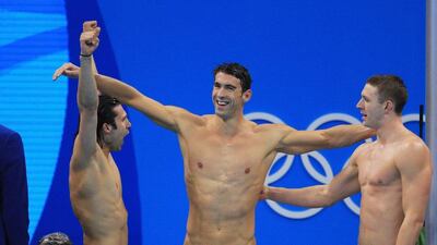 Cody Miller, Michael Phelps and Ryan Murphy of the United States celebrate winning gold in the men’s 4x100m medley relay final on Day 8 of the Rio 2016 Olympic Games at the Olympic Aquatics Stadium on August 13, 2016 in Rio de Janeiro, Brazil. Tom Pennington / Getty Images