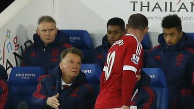 Manchester United manager Louis van Gaal shown with Wayne Rooney after his substitution against Leicester City last weekend in the Premier League. John Sibley / Action Images / Reuters / November 28, 2015