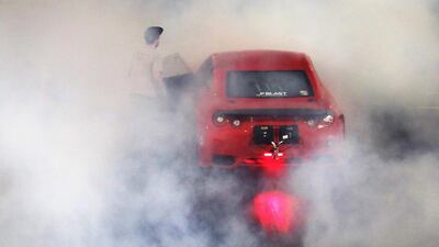 More than 50 cars took to the drag strip at Yas Marina Circuit for the final round of the Yas Super Street Challenge. Pawan Singh / The National