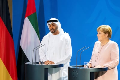 Sheikh Mohamed gives a joint speech with Angela Merkel, who was then chancellor of Germany, in Berlin in 2019. Photo: Ministry of Presidential Affairs