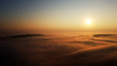 Early morning fog in the desert in Al Badayer, Sharjah. Pawan Singh / The National