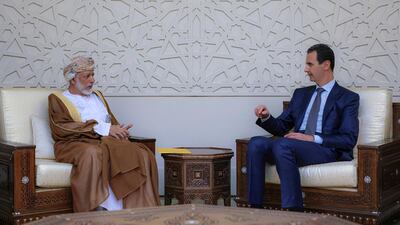 Oman’s Foreign Minister Yusuf bin Alawi, left, meets Syrian President Bashar Al Assad in Damascus on July 7. AP/SANA