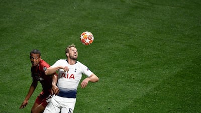 Liverpool's defender Joel Matip fights for the ball with Tottenham Hotspur's striker Harry Kane. AFP