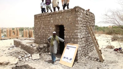 Local masons assist in an international project to restore 14 mausoleums destroyed in Timbuktu, Mali, using traditional materials and techniques. Sebastien Rieussec / AFP