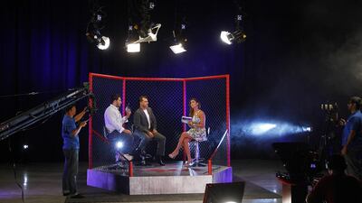 Ali Mokdad, Rio Altaie and Jory Bakr on Physique TV wait for the cue, held at the Inmuscle Facility Al Ghusais. Jeffrey E Biteng / The National