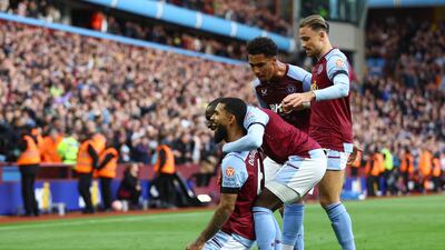 Aston Villa's Douglas Luiz celebrates scoring their first goal with Moussa Diaby, Matty Cash and Boubacar Kamara. Action Images