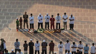 People attend prayers for the Muslim holiday of Eid Al-Adha at Istiqlal Mosque in Jakarta, Indonesia. Iqro Rinaldi / Reuters