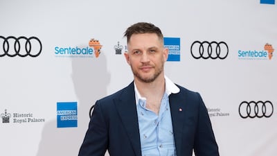 British actor Tom Hardy poses on the red carpet during the concert. EPA