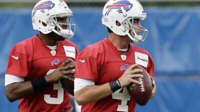 Rookie EJ Manuel, left, is a step or two ahead of veteran Kevin Kolb in the battle to be the starting quarterback of the Buffalo Bills.
