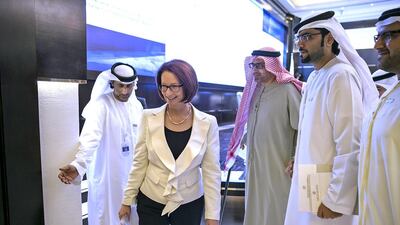 Julia Gillard, former prime minister of Commonwealth of Australia, walks with guests after she delivered her lecture The UAE and Australia: a Roadmap for Future Cooperation yesterday. Silvia Razgova / The National