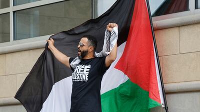 A pro-Palestinian demonstrator protests outside the Arab American National Museum in Dearborn, Michigan. AFP