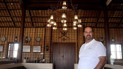 Rashad Koudsi, the general manager of Arabian Nights Village, spends week-long stretches living on site in the Al Khatem desert. Satish Kumar / The National