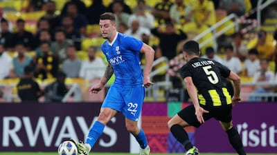 Al Hilal midfielder Sergej Milinkovic-Savic passes the ball whilst under pressure from Luiz Felipe. Getty Images