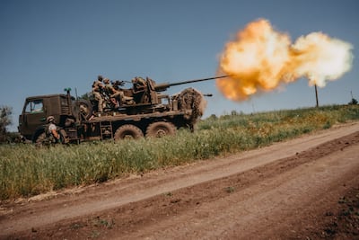 Ukrainian soldiers fire at Russian positions in Ukraine. Getty Images