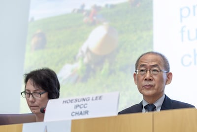 Elena Manaenkova, World Meteorological Organisation deputy secretary-general and Hoesung Lee, right, at the United Nations Intergovernmental Panel on Climate Change event on Thursday in Geneva. Martial Trezzini / EPA