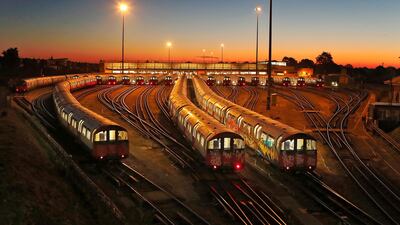 Piccadilly Line underground trains are parked at a depot at Boston Manor station in London, UK, at sunrise.Frank Augstein/AP Photo