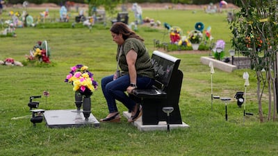 Veronica Mata visits the gravesite of her daughter, Tess, who was among the 19 people fatally shot at Robb Elementary School in Uvalde, Texas. AP