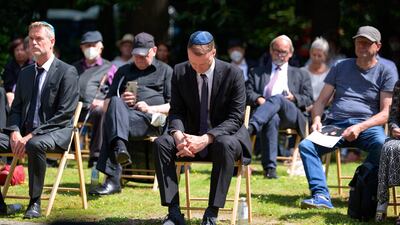 Anti-semitism commissioner Stefan Hensel (C) at the funeral service of Esther Bejarano, who survived the Nazi camp Auschwitz-Birkenau. Azhar Qayum, chief of Mend, is accused of expressing anti-Semitism in a social media post. AFP