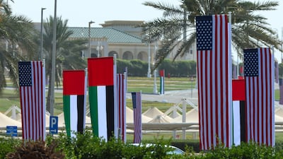 UAE and US flags near Abu Dhabi airport. Victor Besa / The National