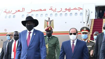 Egypt's President Abdel Fattah al-Sisi and South Sudan's President Salva Kiir, wearing protective face masks, are seen in Juba, South Sudan, November 28, 2020. The Egyptian Presidency via Reuters.