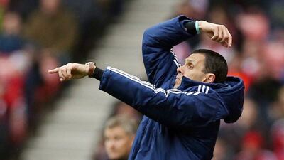 Sunderland manager Gus Poyet gestures during his side's win over Cardiff City on Sunday. Ian MacNicol / AFP / April 27, 2014